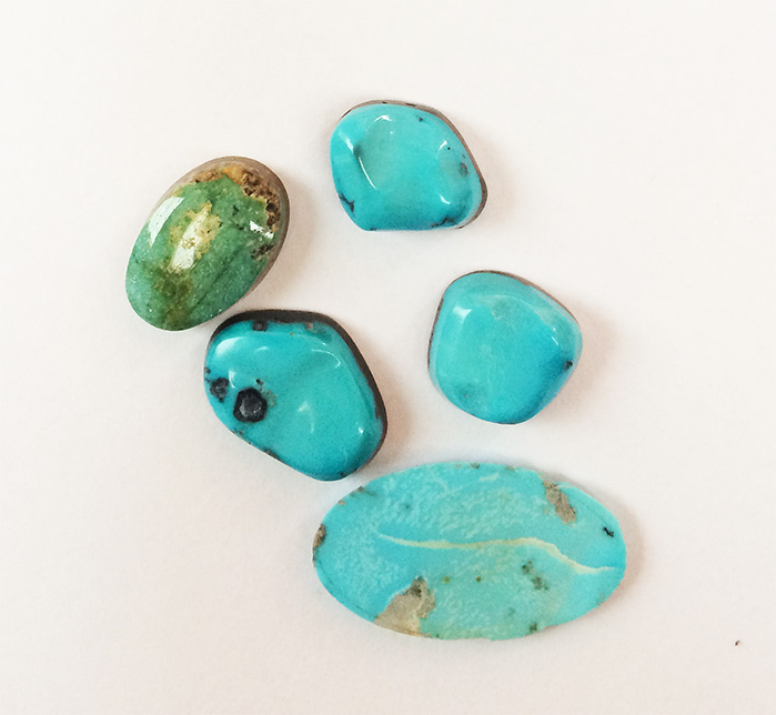 Turquoise cabochons various sizes and shapes. 5 per bag 