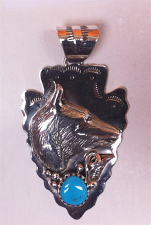 Wolf pendant with Turquoise